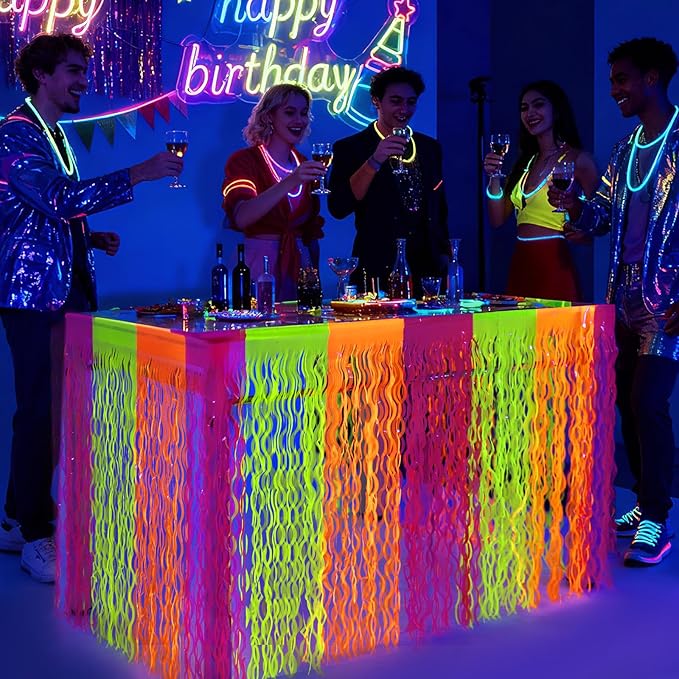 Glow in The Dark Party Supplies, 2 Pack Neon Fluorescent Wavy Metallic Tinsel Foil Fringe Table Skirts, 29.5x108 Inch UV Black Light Reactive Table Streamer Curtain Backdrop Party Decorations