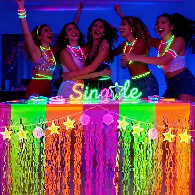 Glow in The Dark Party Supplies, 2 Pack Neon Fluorescent Wavy Metallic Tinsel Foil Fringe Table Skirts, 29.5x108 Inch UV Black Light Reactive Table Streamer Curtain Backdrop Party Decorations